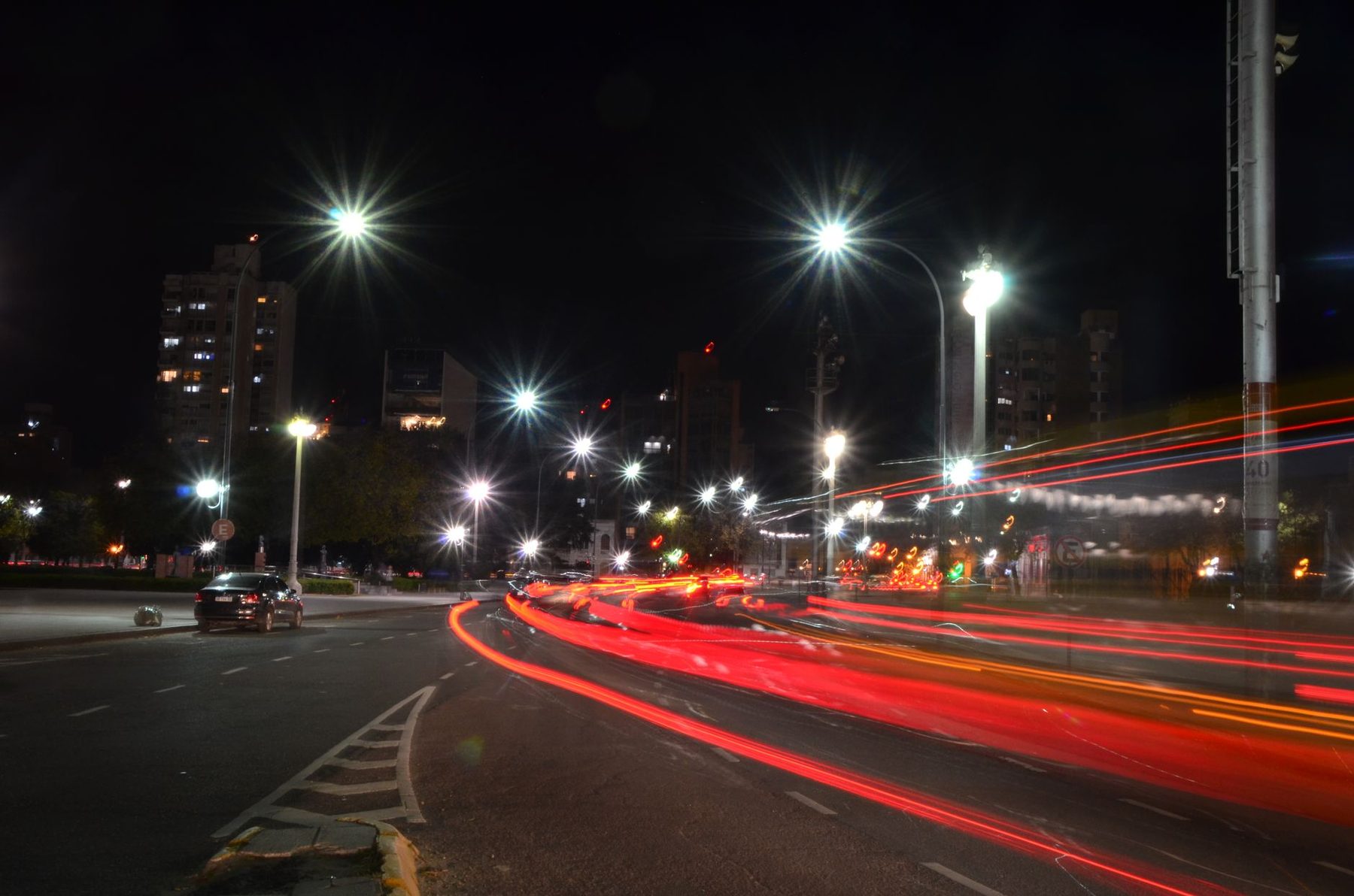 Night traffic light trails through a city street