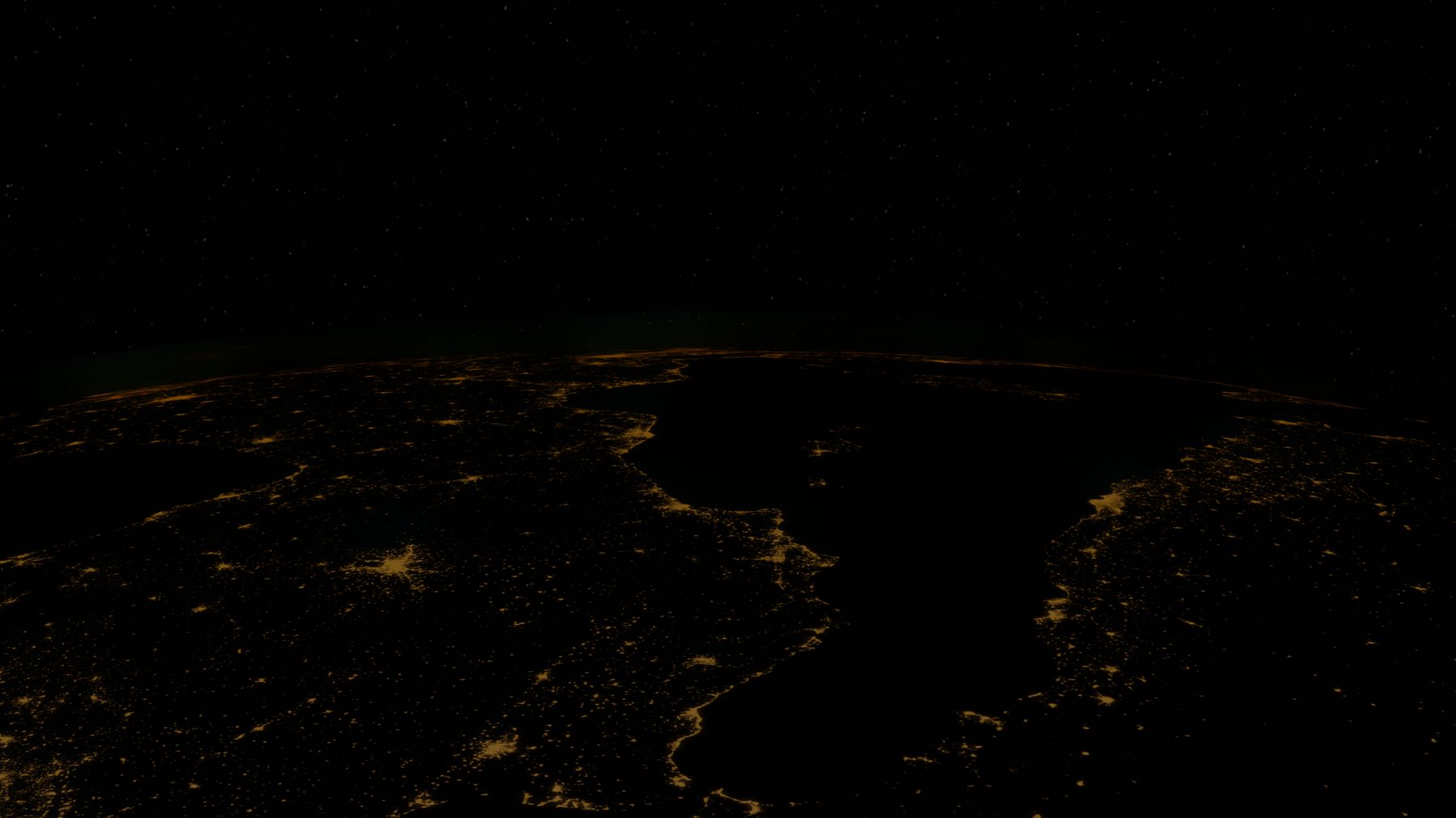 Earth at night from orbit with city lights across the continents
