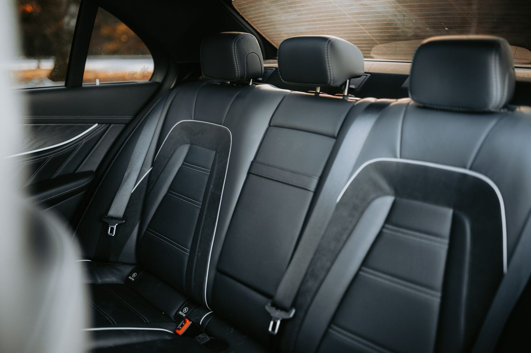 Black leather rear seats inside a luxury saloon